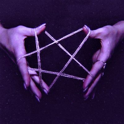 two hands are holding sticks in the shape of a pentagramil, which is connected to each other