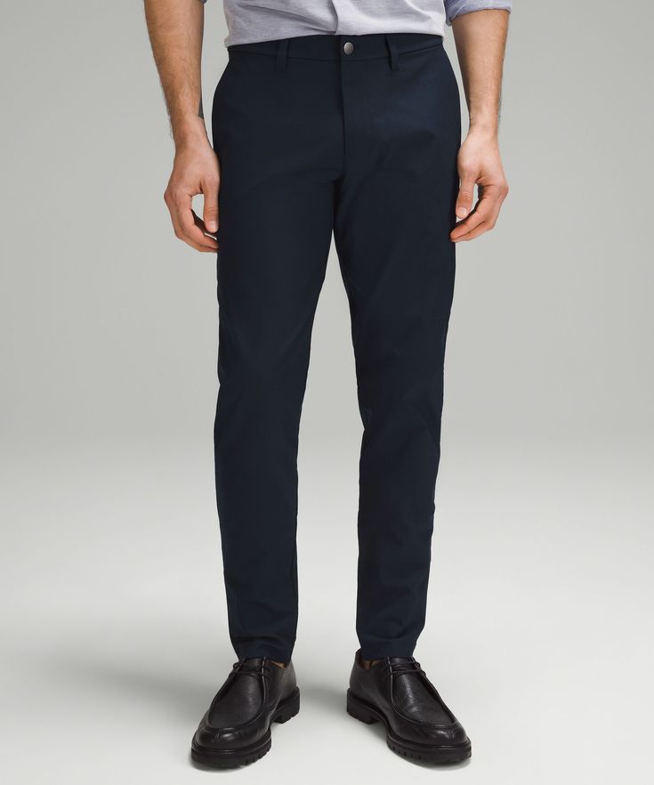 Welcome to the all-day comfort club. Previously known as the Commission Pant, we've removed the back-knee seam from these trousers for a more elevated look. Designed for Casual. You asked, we listened. Based on guest feedback, this slim fit still skims your leg from hip to hem, but now has a roomier feel in the glutes and thighs:Our ABC technology uses an ergonomic gusset to remove tension from the crotch of our pants. Discreet zippered pocket on side seam. Back welt pockets with hidden snaps. F Slim Fit Trousers, Mens Joggers, Twill Fabric, Personal Shopping, Mens Trousers, Welt Pockets, Welt Pocket, Abc, Water Resistant