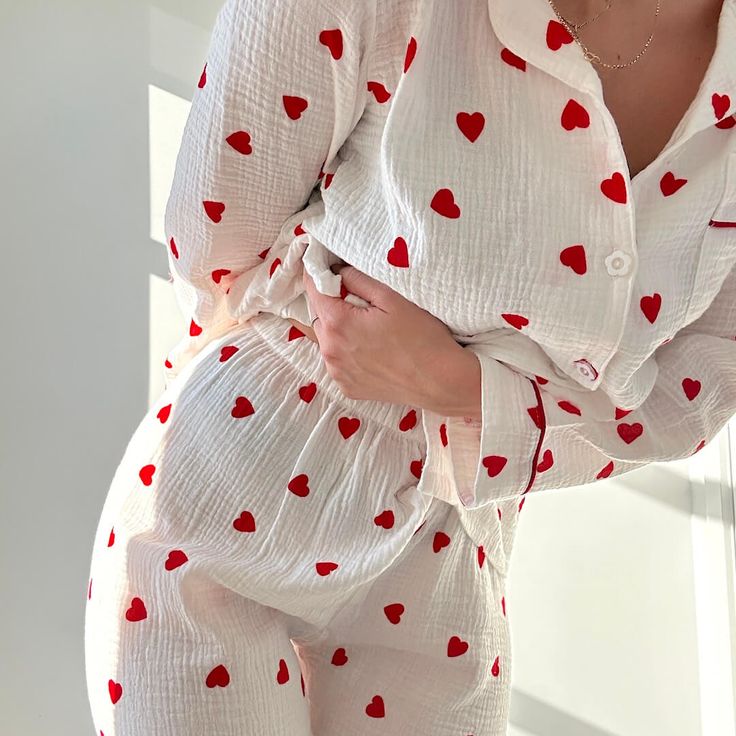 The perfect blend of romance and relaxation Fall in love with the charming heart-patterned design that adorns our Lover's Pajama Women's Loungewear Set. A visual symphony of affection, perfect for cozy nights and lazy mornings. These pajamas aren't just sleepwear; they're a matching ensemble designed for unforgettable moments. The cutest trouser matching pj set. Dive into comfort with the matching pajamas, featuring a trouser pajama that seamlessly combines style and ease. Our Lover's pjs are cr Cute Aesthetic Pajamas, Nightsuits For Women, Cute Pjs Aesthetic, Pijama Aesthetic, Pjs Ideas, Heart Pj Set, Pyjamas Aesthetic, Pj Aesthetic, Aesthetic Pajama