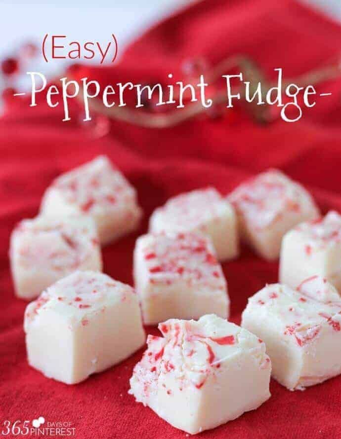 easy peppermint fudge recipe with white chocolate and candy canes on a red cloth