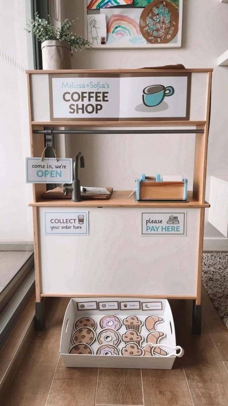 the coffee shop is open and ready for customers to purchase their drinks or donuts