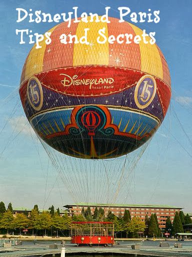 a hot air balloon with the words disneyland paris tips and secrets on it's side