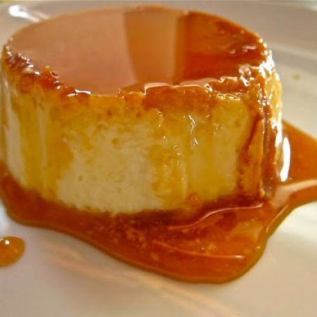 a piece of cheesecake on a plate with sauce