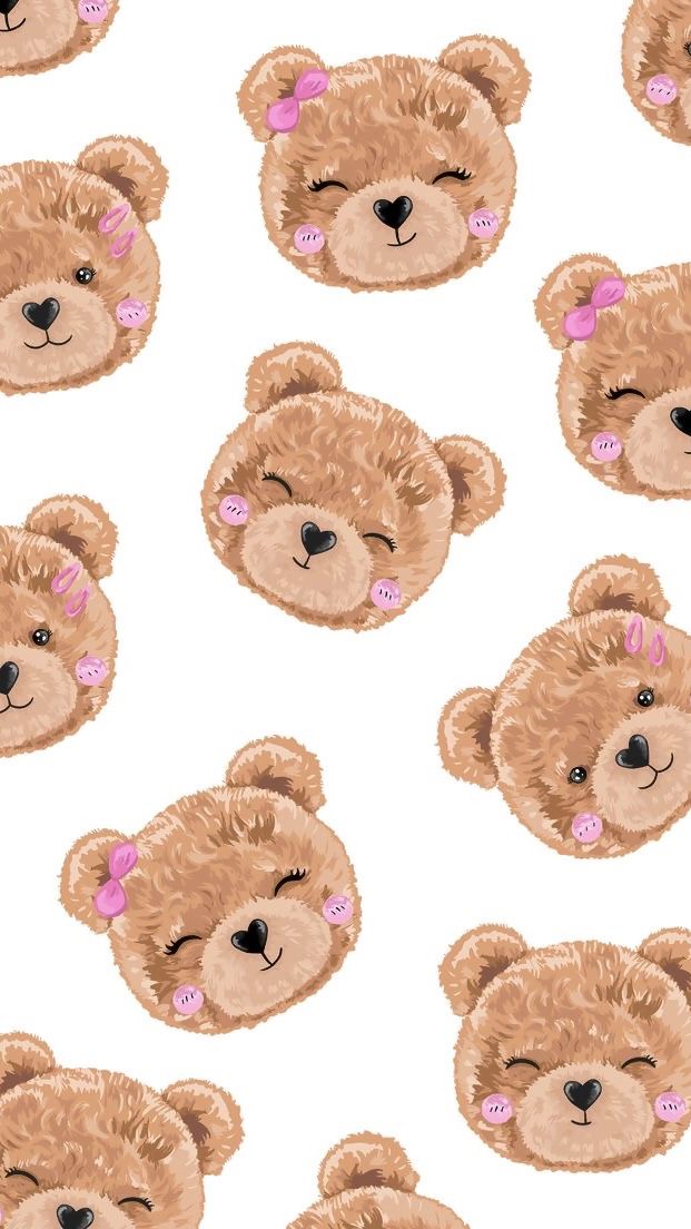 the teddy bears have pink bows on their ears