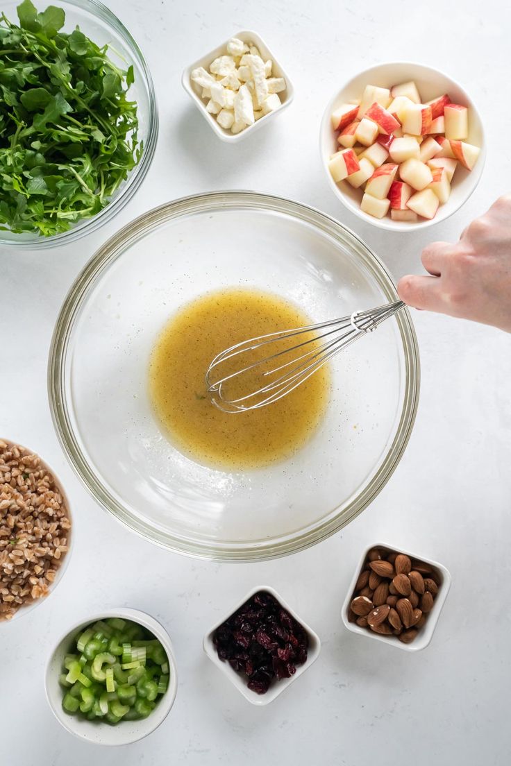 the ingredients to make this salad are in bowls