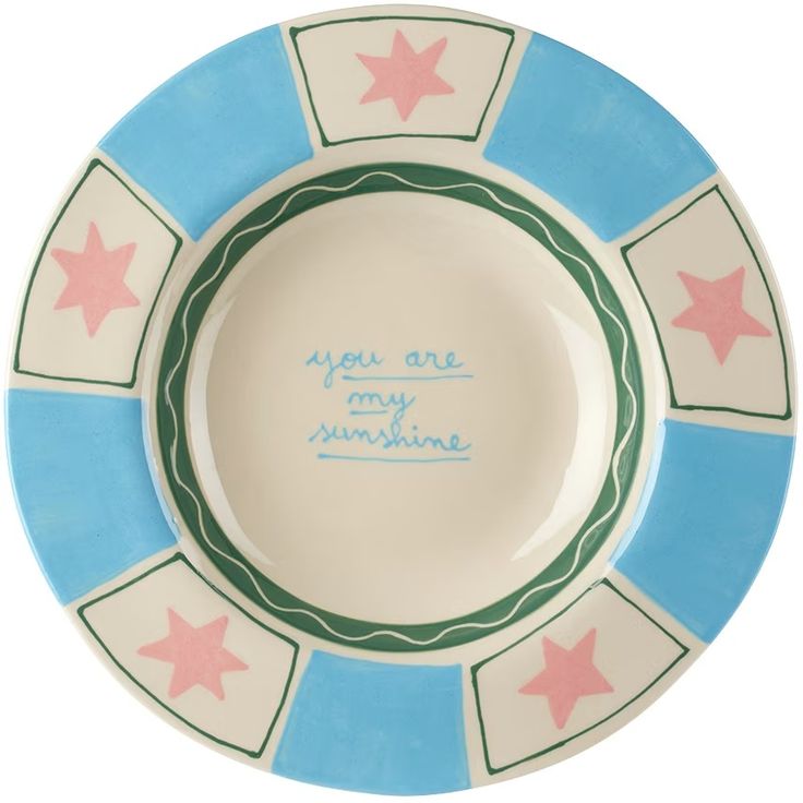 a blue and white plate with pink stars on it that says, you are my sunshine