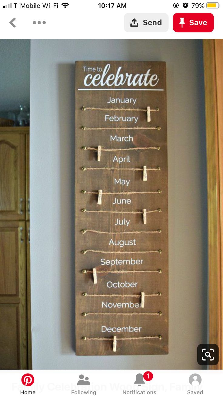 a wooden calendar hanging on the wall