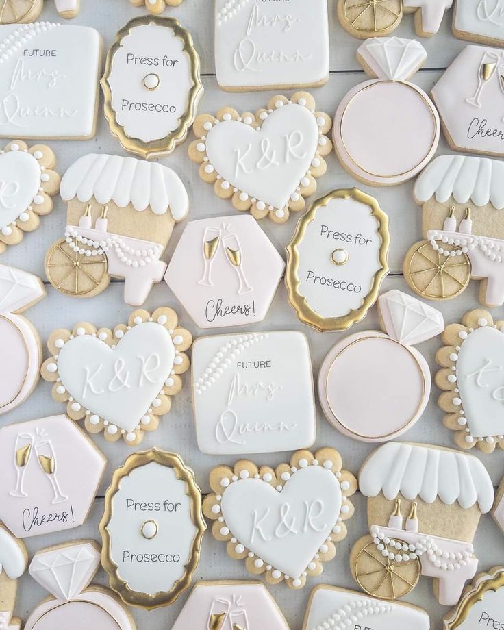 some cookies that are decorated to look like baby's first birthdays and other items