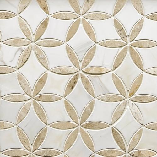 a close up view of a white and gold tile wall with circles on the side