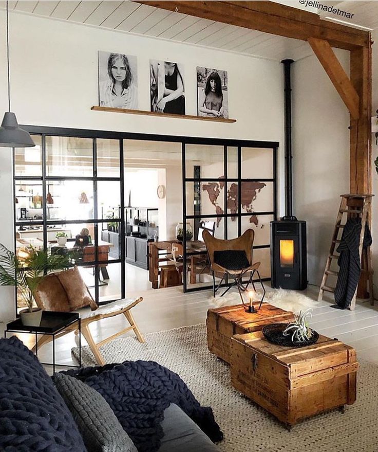 a living room filled with furniture next to a fire place in a home decorating project