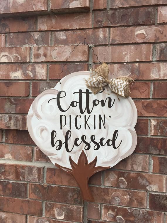 a sign on the side of a brick building that says cotton pickin'blessed