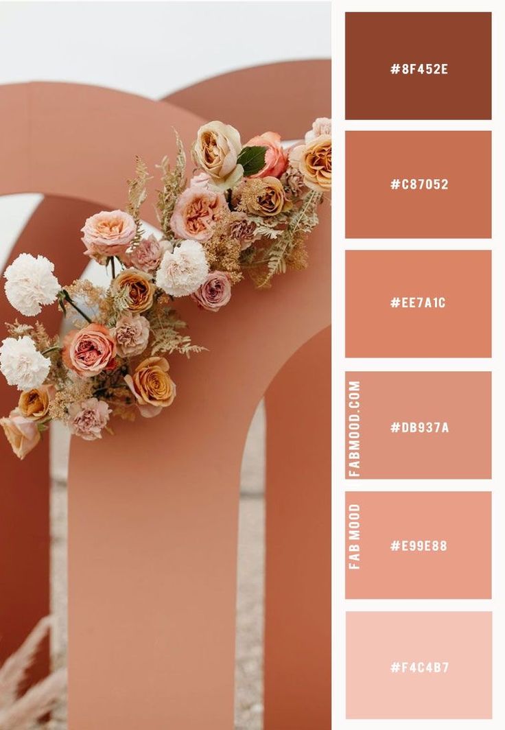 the color scheme is peach and brown with white flowers on it, along with other colors