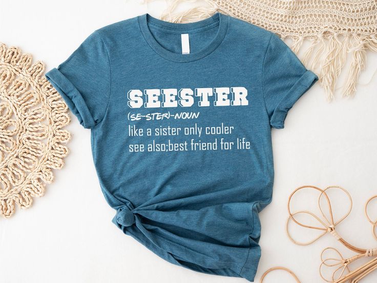 Best Sister Gift, Personalized Seester Definition Shirt, Seester Noun Shirt, Cool Sister Present, Big Sis Shirt, Little Sister Shirt, Sister -----How To Order----- 1-) Please, check and review all photos 2-) Choose your t-shirt size and color *Different styles of shirts may have different shades of same color choice due to different manufacturer brands. *For this reason, we recommend you to match shirts from the same styles if you want precisely matching colors (exa. Unisex, V-neck, Tank top, et Seester Shirt, Definition Shirt, Sister Shirt, Best Friends For Life, Best Sister, Big Sis, Sister Shirts, Matching Colors, Little Sisters