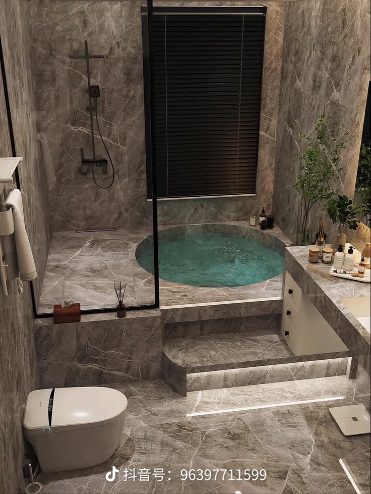 a bathroom with a large jacuzzi tub next to a toilet