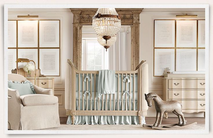 a baby crib with a rocking horse next to it