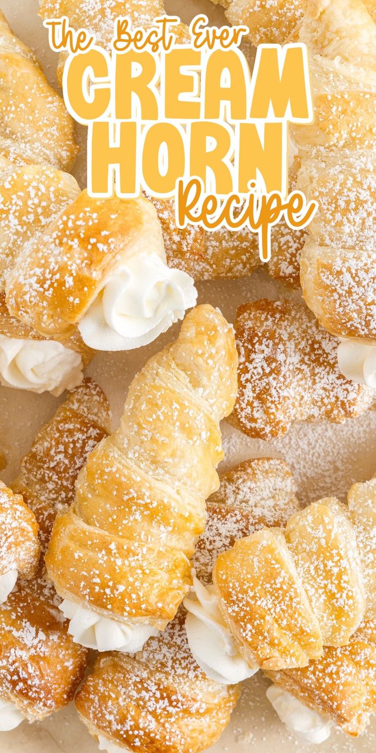 the best ever cream horn recipe is made with puff pastry and powdered sugar on top