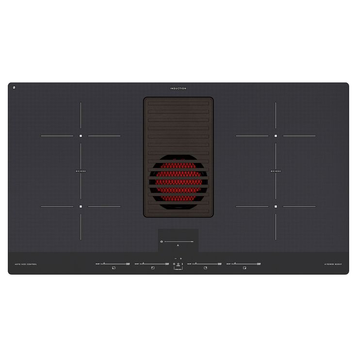 a black stove top with a red light on it