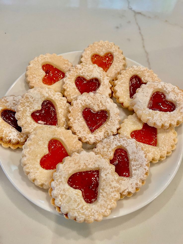 heart shaped pastries on a white plate