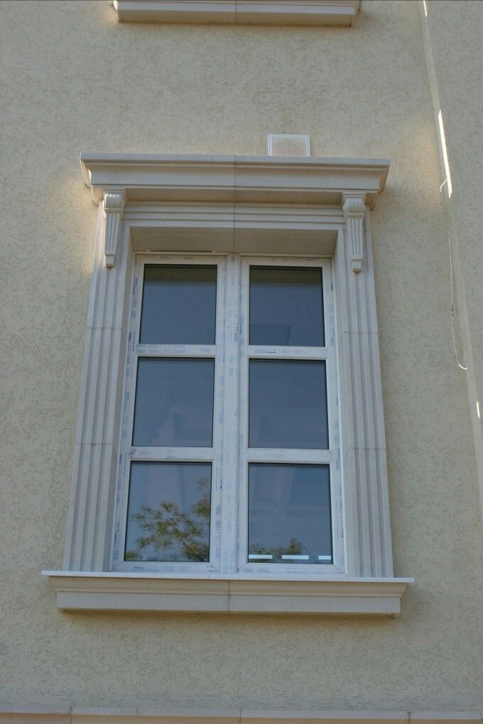 an image of a window that is on the side of a building