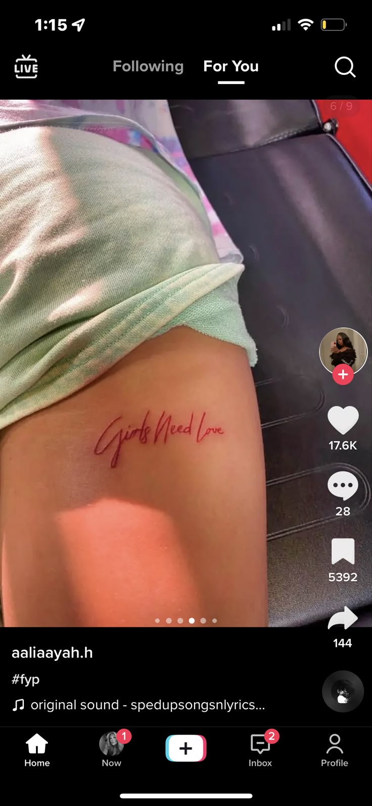 the back of a woman's thigh with an inscription on it