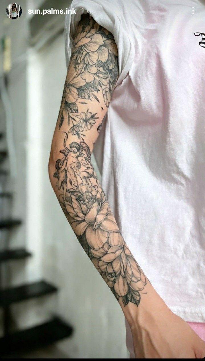 a person with a flower tattoo on their arm