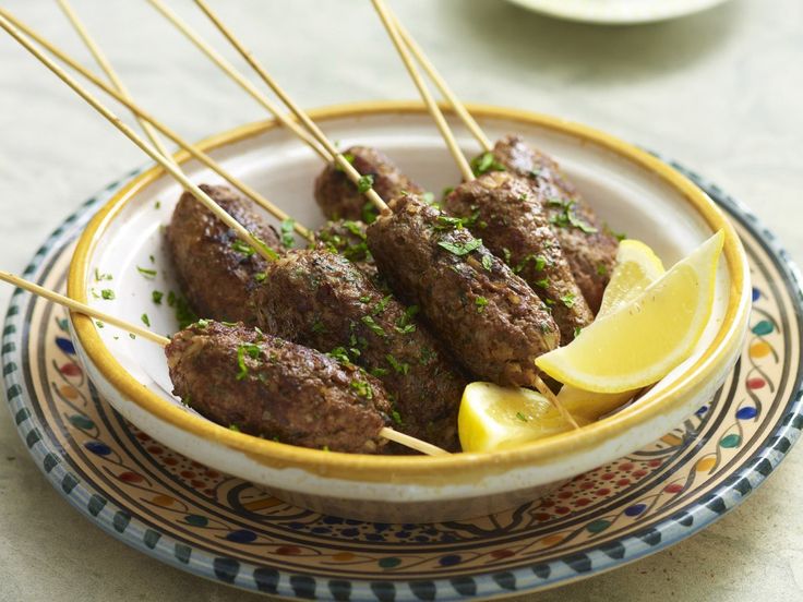 meatballs with lemon and parsley on a plate