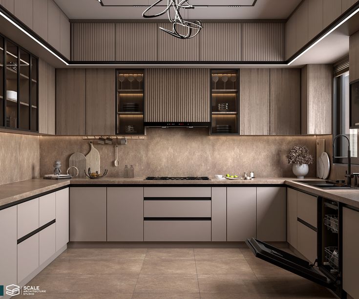 a modern kitchen with white cabinets and beige counter tops, along with an overhead chandelier