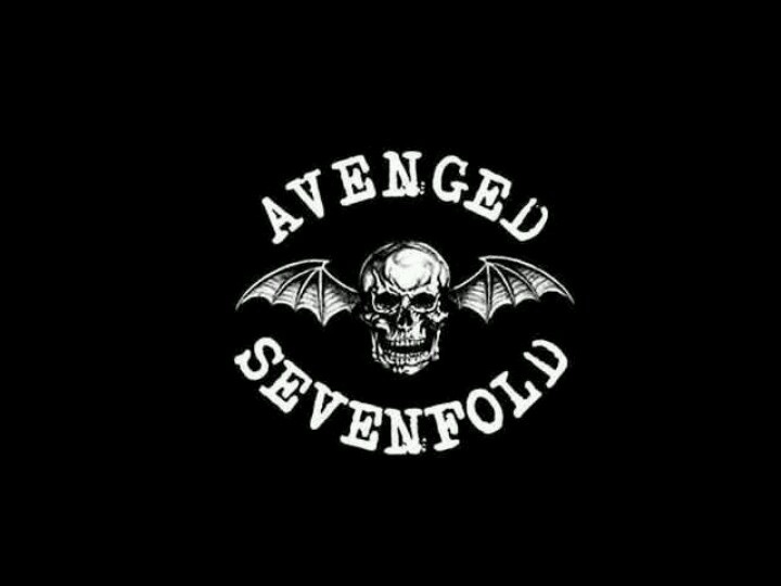 an image of a skull and bat with the words avenge sevenfold written on it