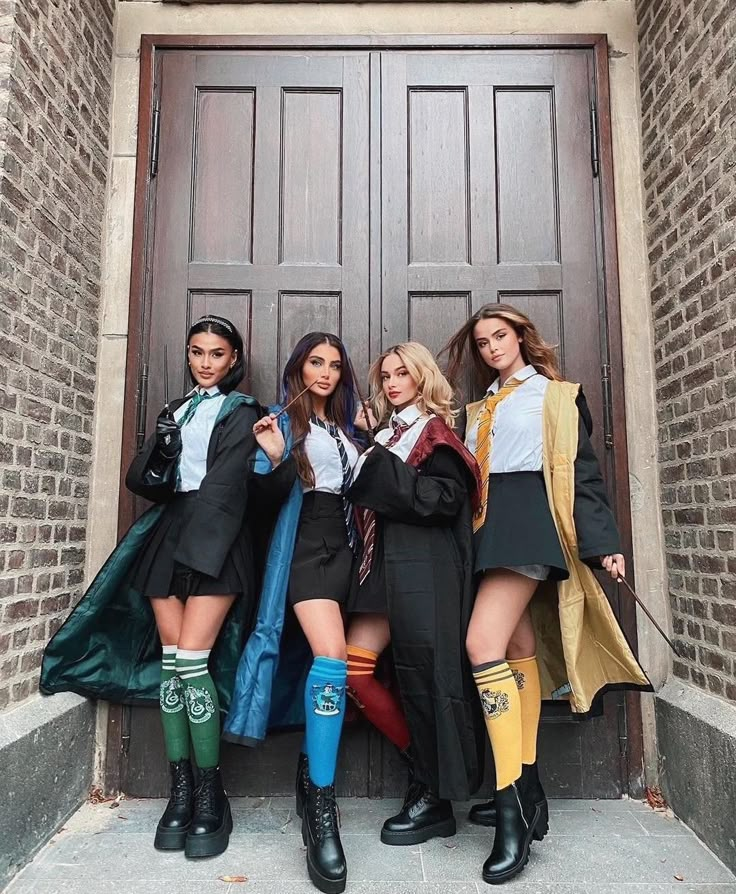 four girls are standing in front of a door