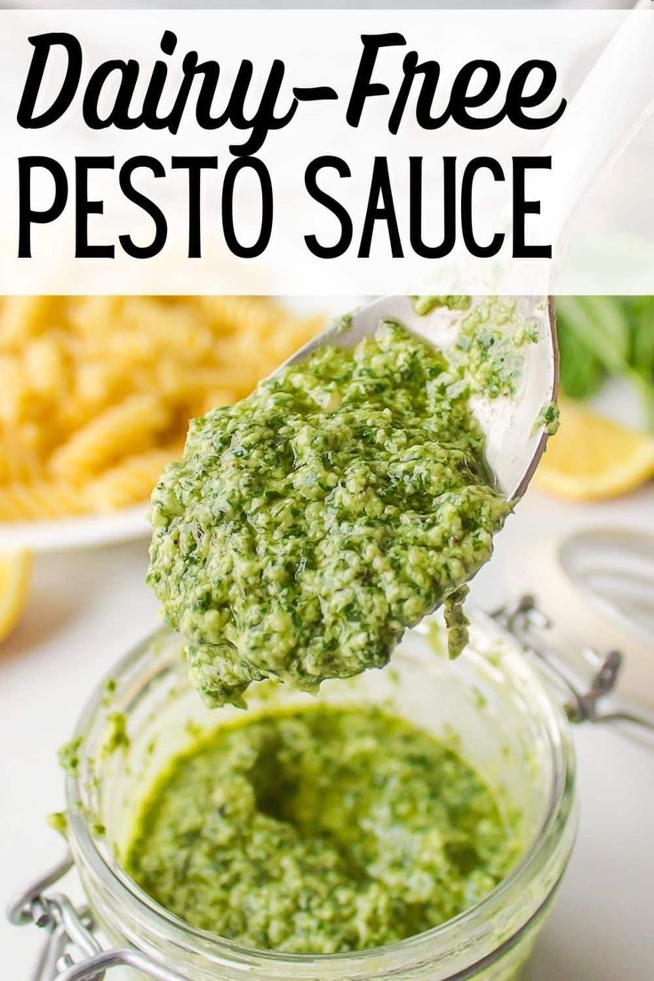 a spoon full of pesto sauce with the words dairy - free pesto sauce above it