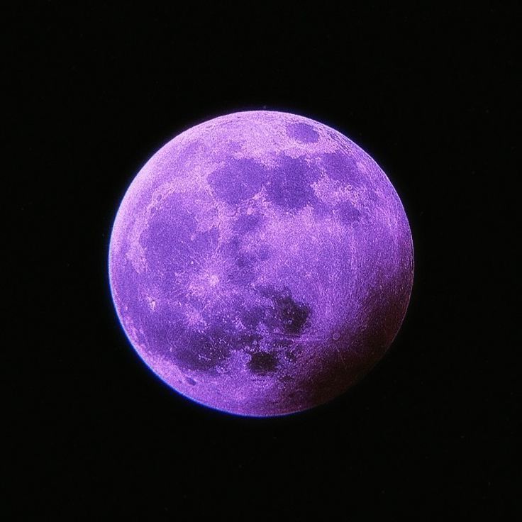 the full moon is purple in the dark sky