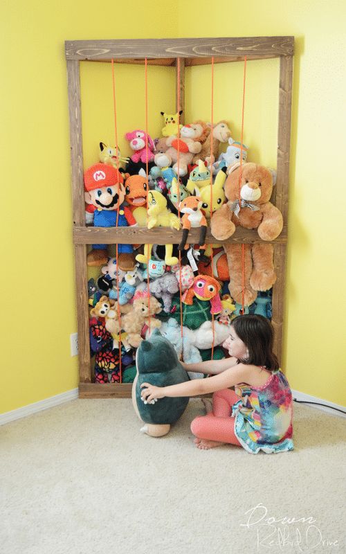 30 Cheap and Easy Clever Toy Organization Ideas You Need To Know Stuffed Animal Storage Diy, Toy Organization Ideas, Coloring Book Storage, Pool Toy Storage, Outdoor Toy Storage, Toy Room Organization, Bath Toy Organization, Diy Toy Storage, Toy Storage Solutions