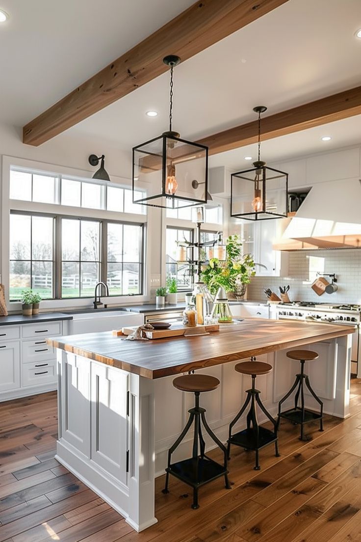 a large kitchen with an island in the middle