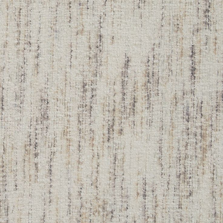 an upholstered fabric textured with grey and white colors