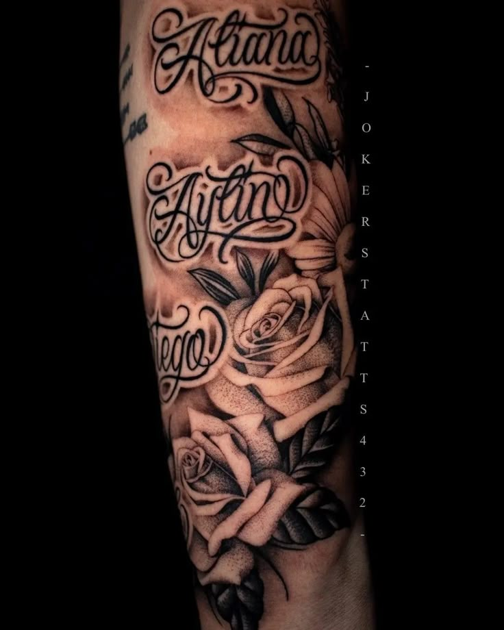 an arm tattoo with roses and the words atlanta on it, in black and white