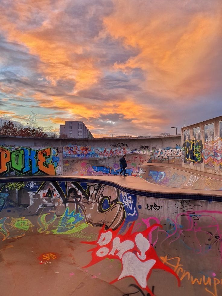 a skateboard park with graffiti all over it