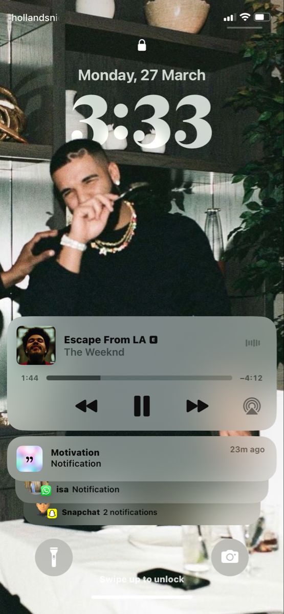 an image of a man on his cell phone with the message escape from la b