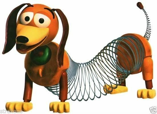 a cartoon dog with a green ball in it's mouth and some wire on its back