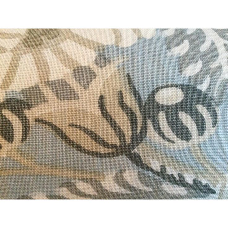 a close up view of the fabric with an abstract design on it's side