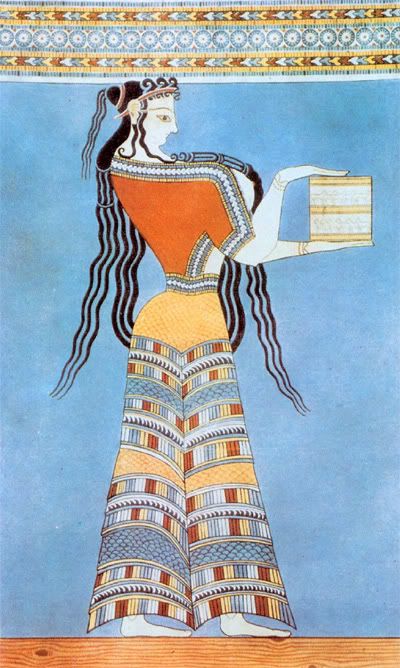 an egyptian woman with long hair holding a box