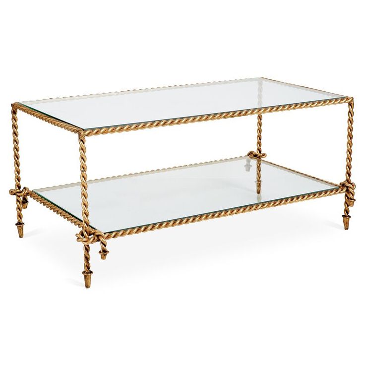 two tiered glass and brass coffee table with roped edges on the bottom shelf