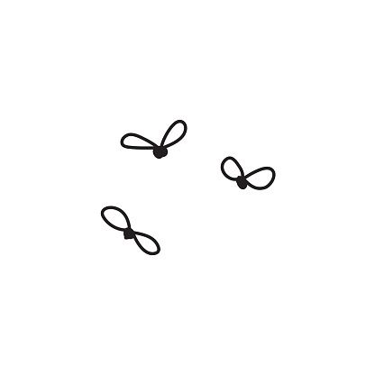 three small black scissors on a white background