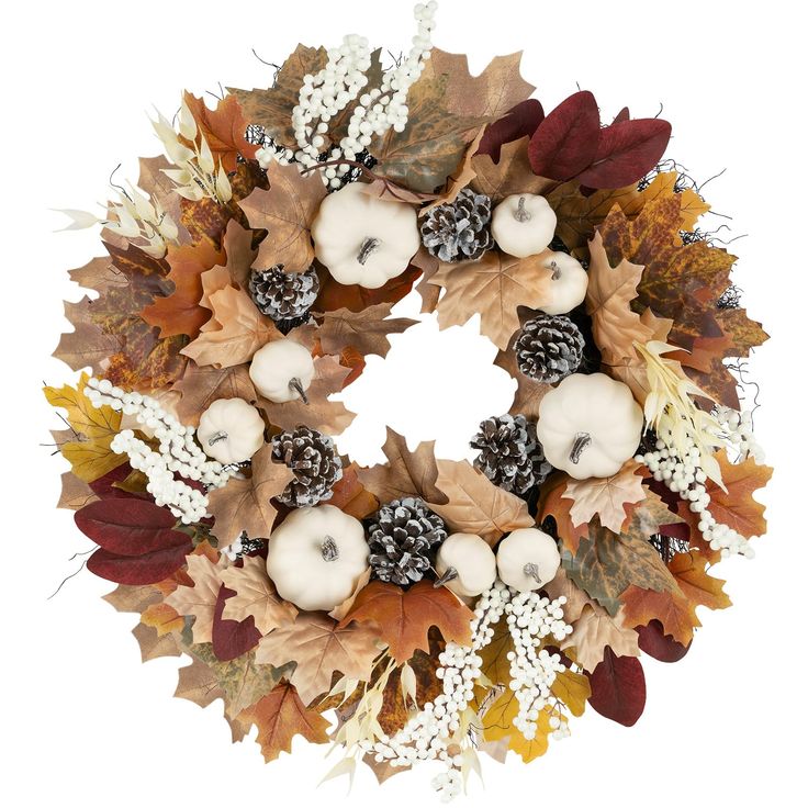 a wreath with white pumpkins and leaves