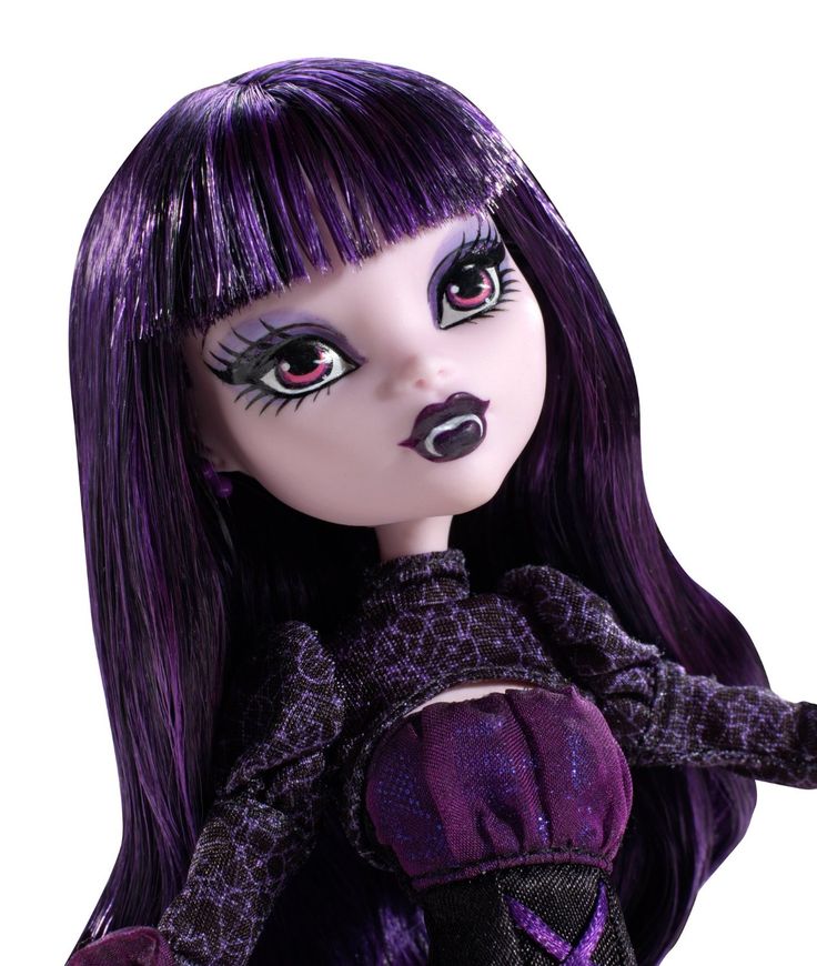 a close up of a doll with purple hair and black eyeliners on her face