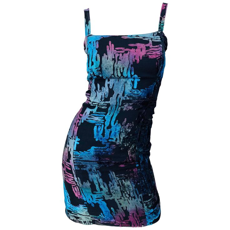 Sexy vintage 90s French designer DANIEL TEALDI Asian inspired graffiti print sleeveless mini dress! Features a black rayon blend backdrop with lurex details throughout. Vibrant colors of blue, teal, pink and purple throughout. Hidden zipper up the back with hookl-and-eye closure. Fully lined. Can easily be worn for any day or evening event. Great with wedges, sandals or flats for day, and heels or boots for evening. In great condition. Made in France Marked Size French 44, which is a US 10 / 12 Asian Graffiti, Colors Of Blue, Graphic Dress, Wedges Sandals, French Designer, Black Mini Dress, Fashion Images, Asian Inspired, Blue Teal