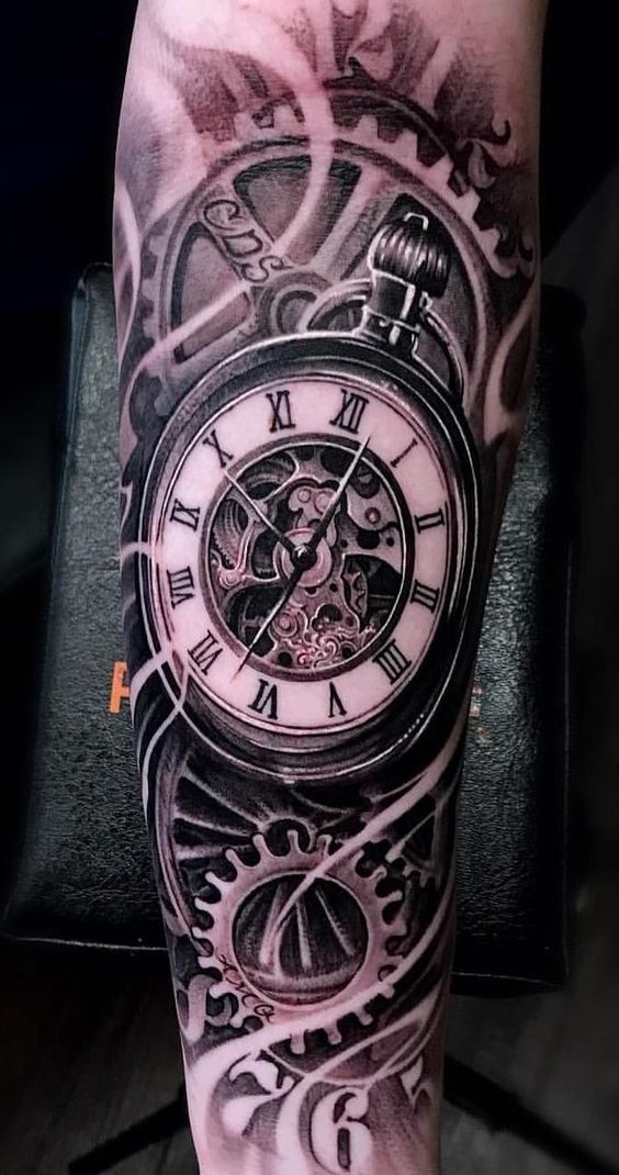 a man's arm with a clock tattoo on it