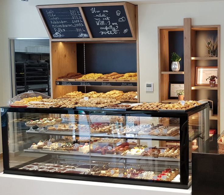 a bakery filled with lots of different types of pastries