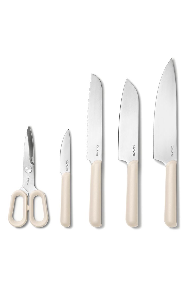 five knives and two scissors are shown in this image