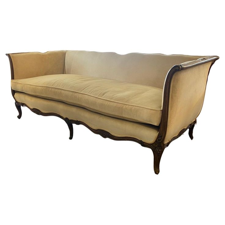 an old fashioned couch is shown against a white background