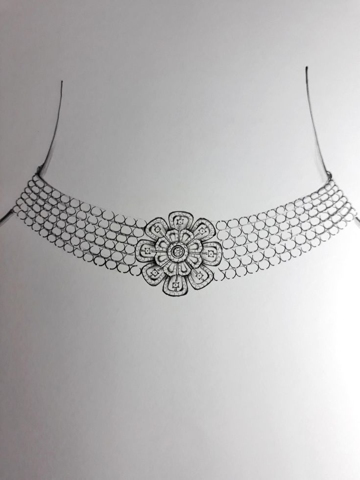 a silver chain with an intricate design on it